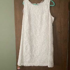 Beautiful white dress with white flower print. Never worn. Tags still on